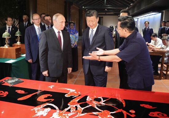 Russian President Vladimir Putin visits China