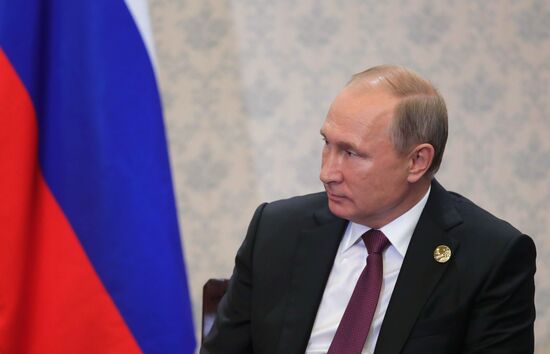 Russian President Vladimir Putin participates in BRICS summit