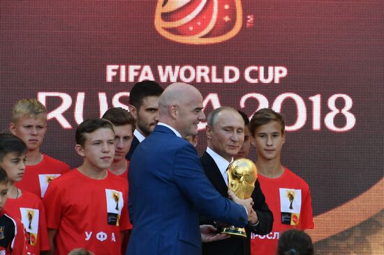 Russian President Vladimir Putin takes part in FIFA World Cup Trophy Tour kick-off ceremony in Luzhniki