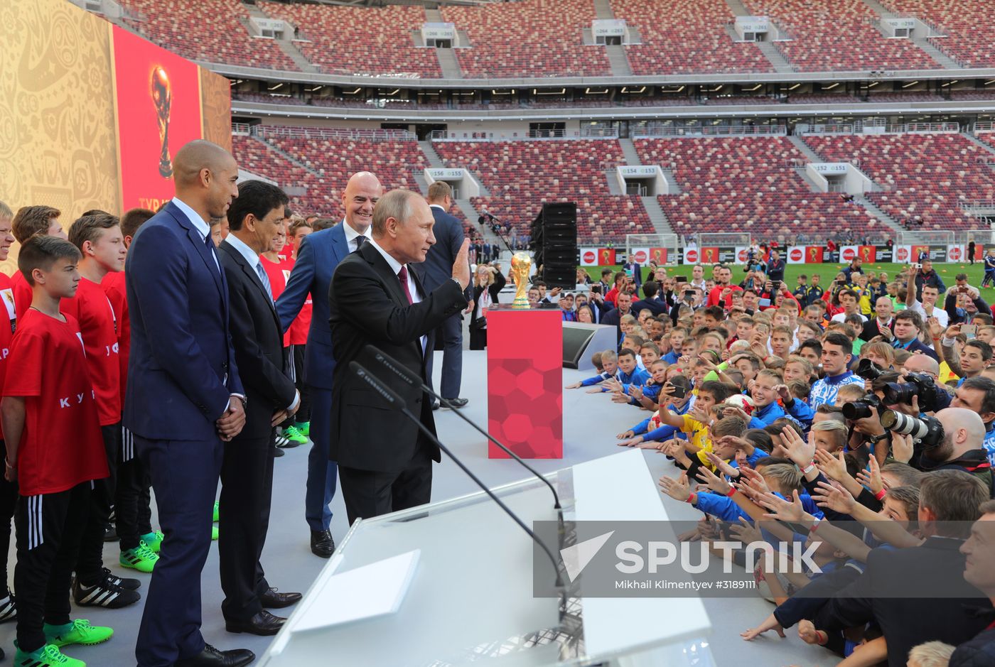 Russian President Vladimir Putin takes part in FIFA World Cup Trophy Tour kick-off ceremony in Luzhniki
