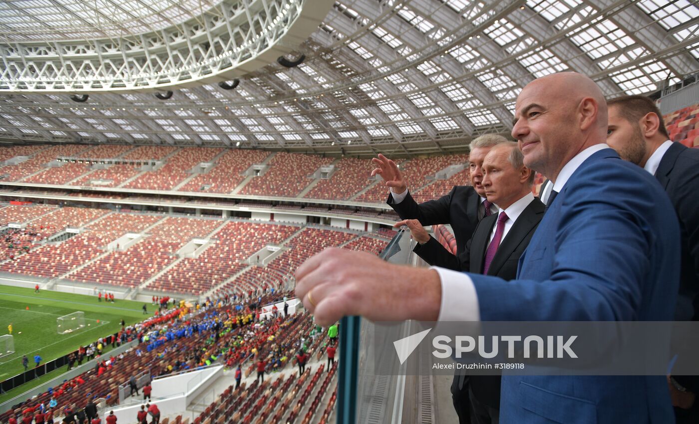 Russian President Vladimir Putin takes part in FIFA World Cup Trophy Tour kick-off ceremony in Luzhniki
