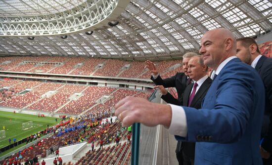 Russian President Vladimir Putin takes part in FIFA World Cup Trophy Tour kick-off ceremony in Luzhniki