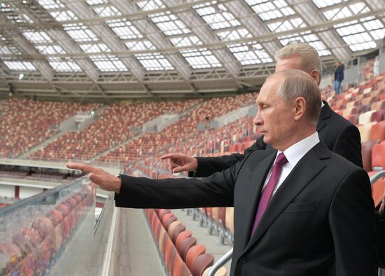 Russian President Vladimir Putin takes part in FIFA World Cup Trophy Tour kick-off ceremony in Luzhniki