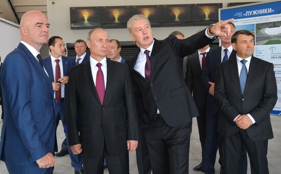 Russian President Vladimir Putin takes part in FIFA World Cup Trophy Tour kick-off ceremony in Luzhniki
