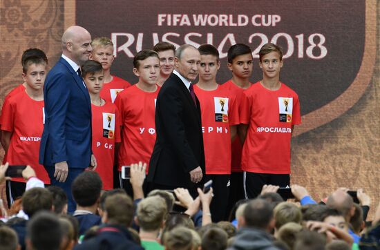 Russian President Vladimir Putin takes part in FIFA World Cup Trophy Tour kick-off ceremony in Luzhniki