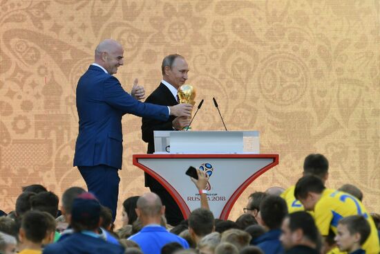Russian President Vladimir Putin takes part in FIFA World Cup Trophy Tour kick-off ceremony in Luzhniki