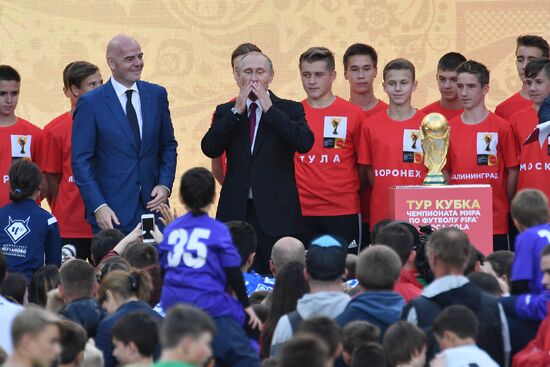 Russian President Vladimir Putin takes part in FIFA World Cup Trophy Tour kick-off ceremony in Luzhniki