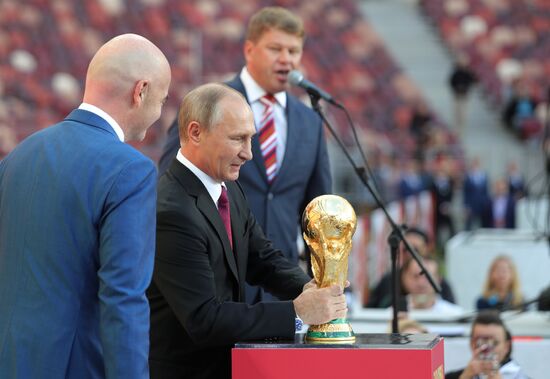 Russian President Vladimir Putin takes part in FIFA World Cup Trophy Tour kick-off ceremony in Luzhniki
