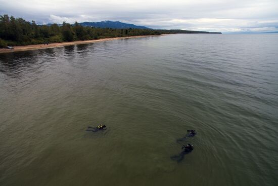 Garbage removal at Lake Baikal's water area and shores