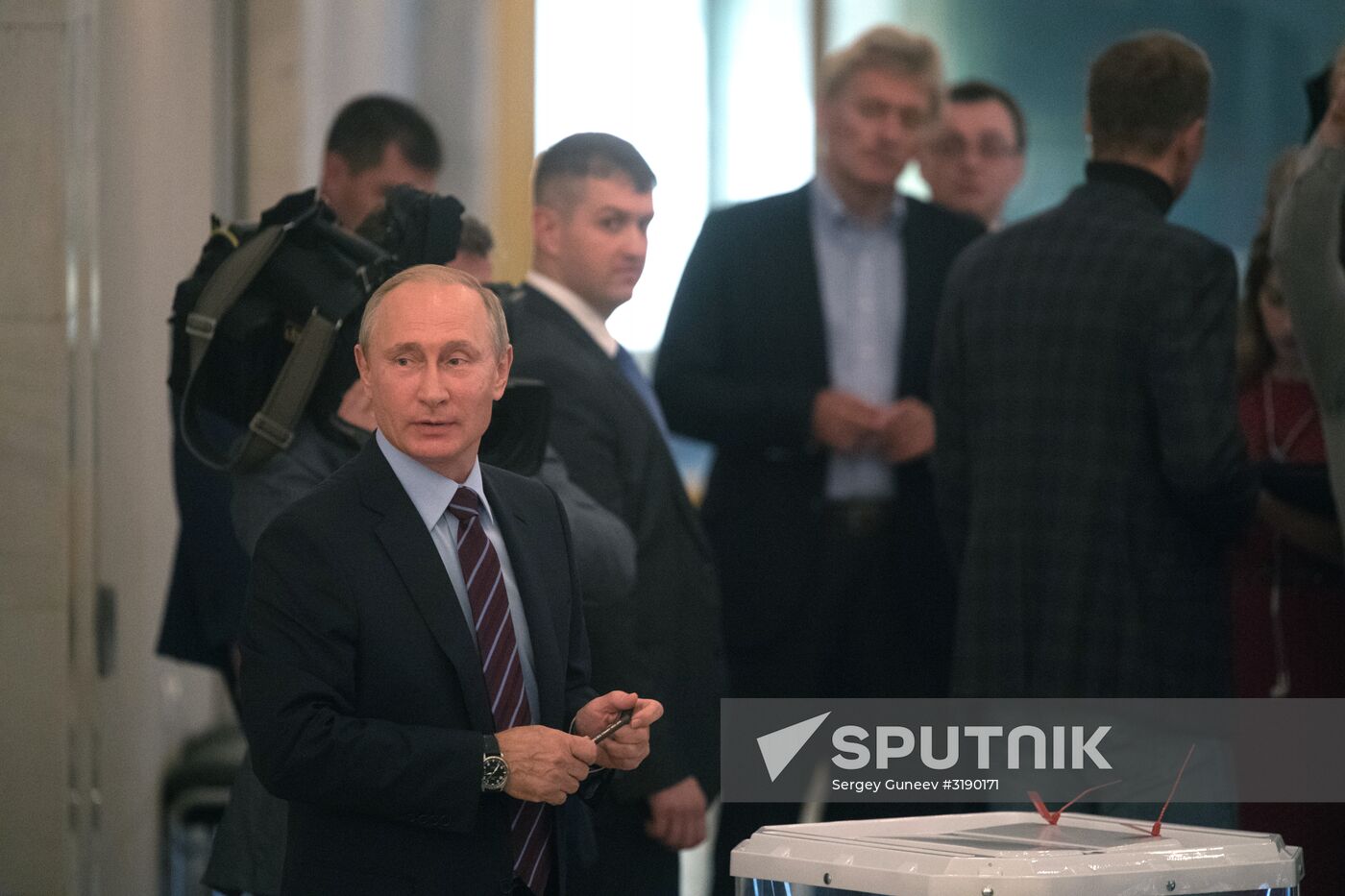 Russian President Vladimir Putin casts his vote on Unified Voting Day