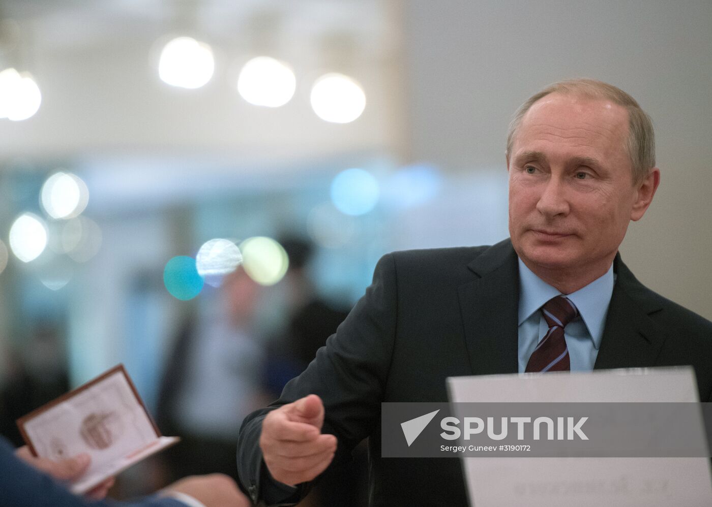 Russian President Vladimir Putin casts his vote on Unified Voting Day