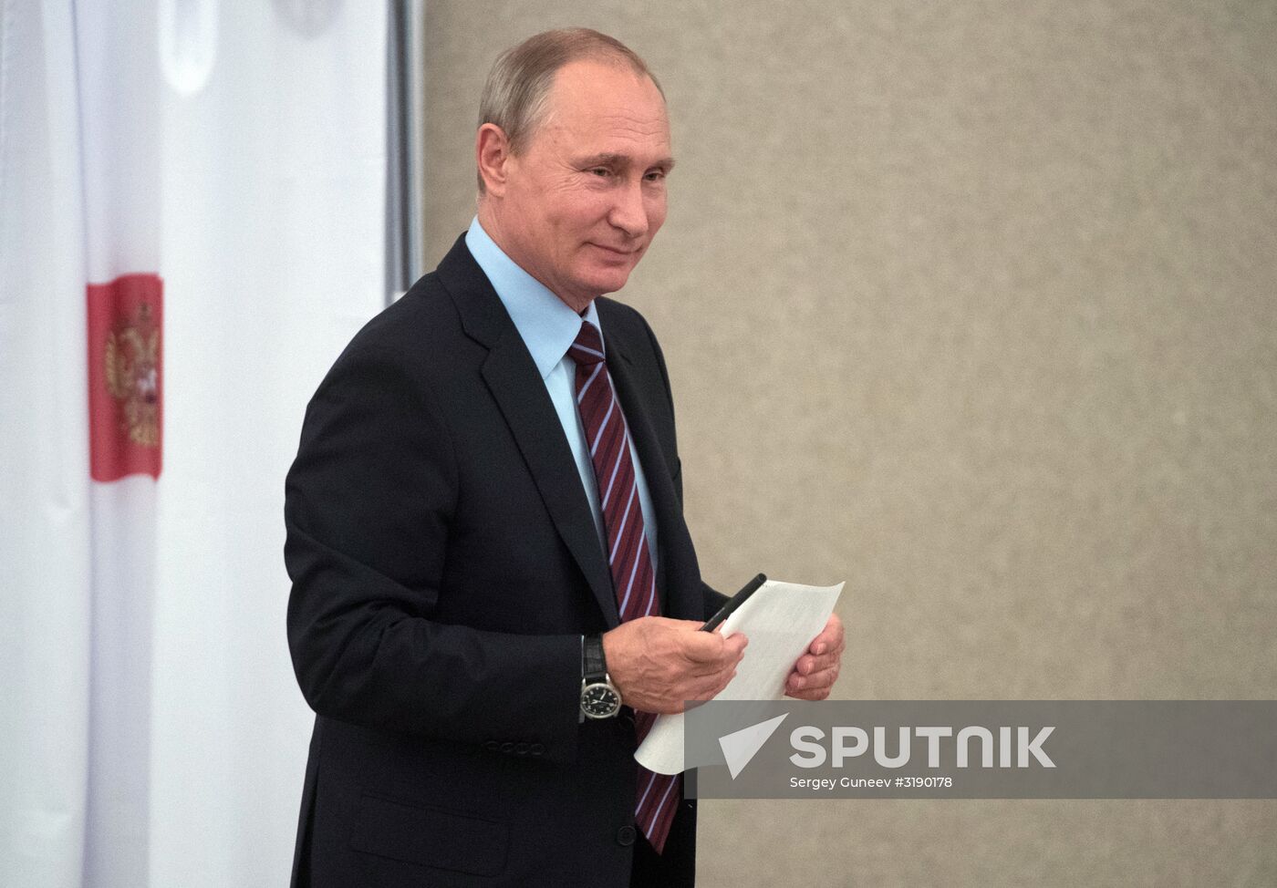 Russian President Vladimir Putin casts his vote on Unified Voting Day
