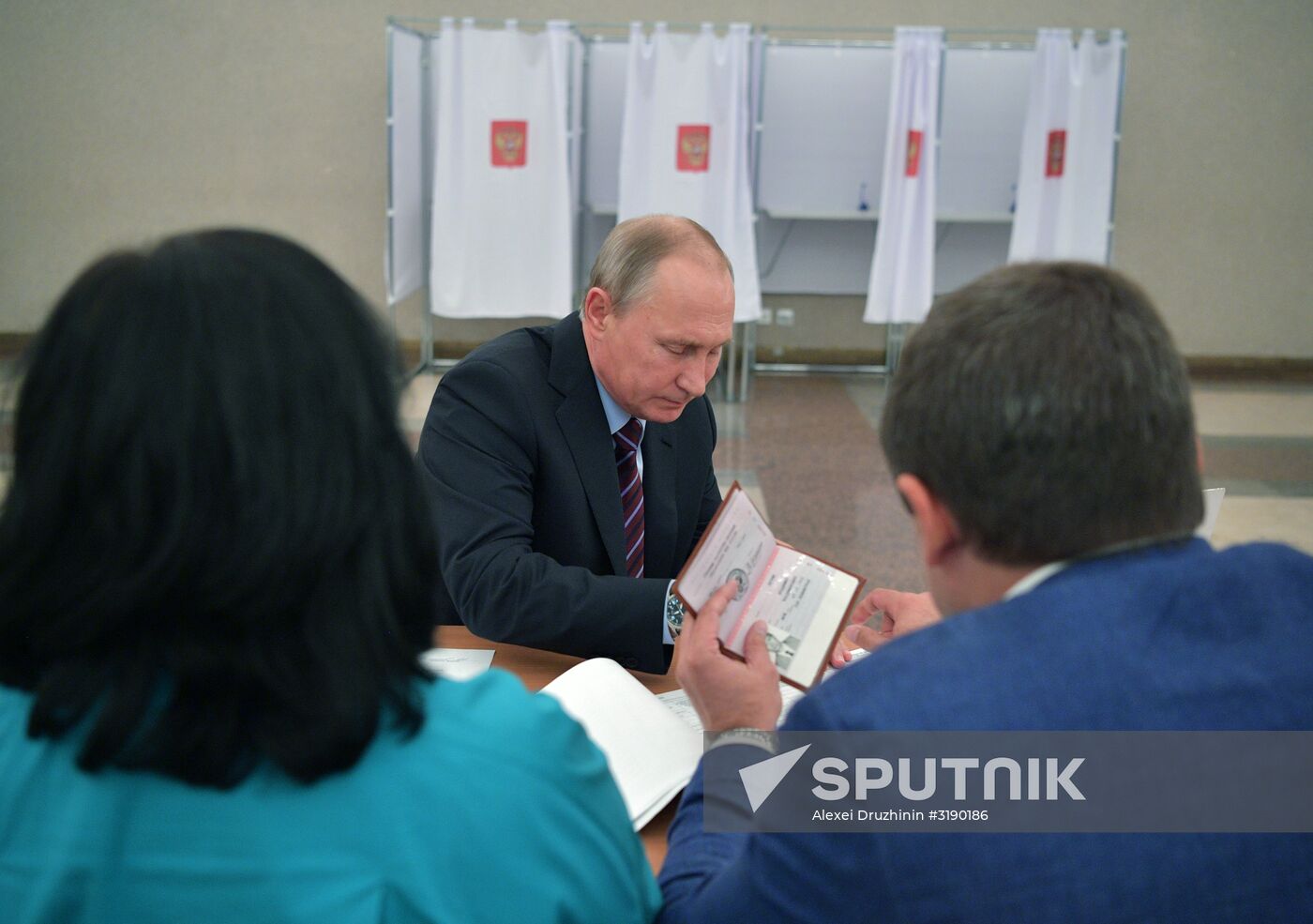 Russian President Vladimir Putin casts his vote on Unified Voting Day