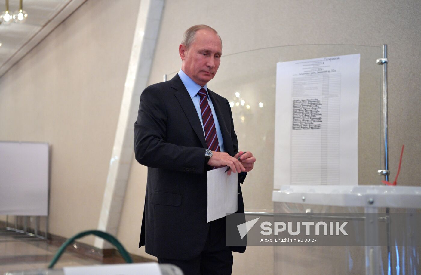 Russian President Vladimir Putin casts his vote on Unified Voting Day