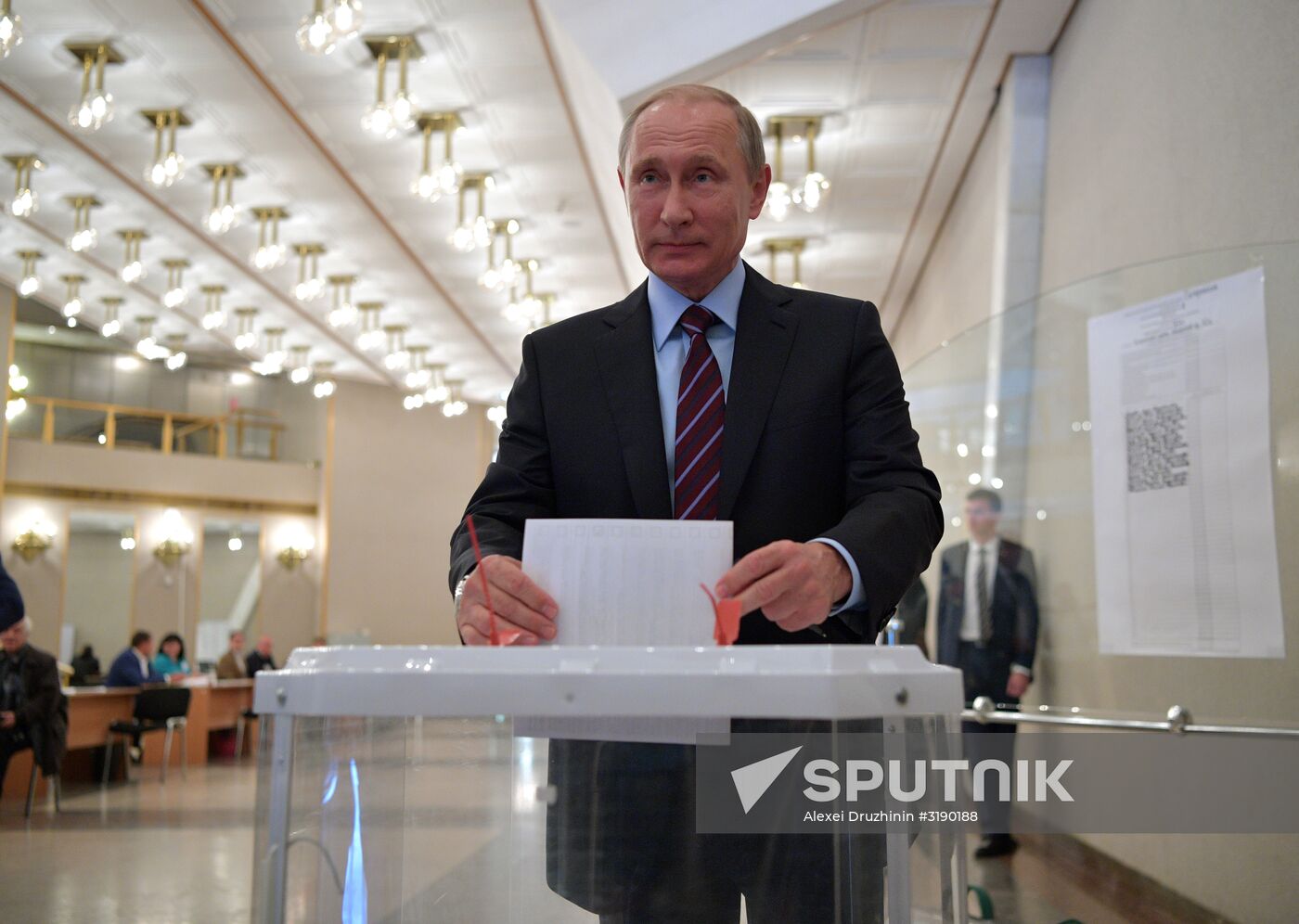 Russian President Vladimir Putin casts his vote on Unified Voting Day