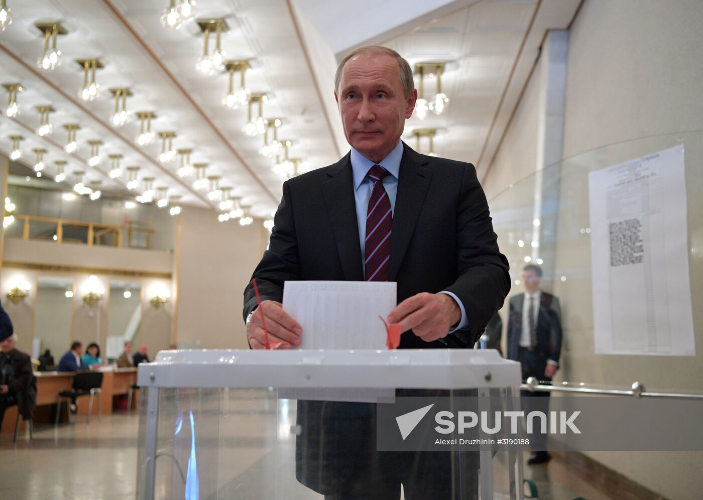 Russian President Vladimir Putin casts his vote on Unified Voting Day