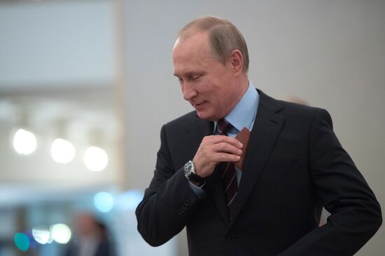 Russian President Vladimir Putin casts his vote on Unified Voting Day