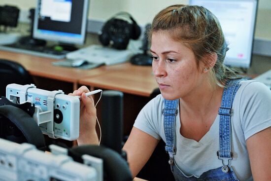 Young women take exams while enrolling at Krasnodar Aviation School