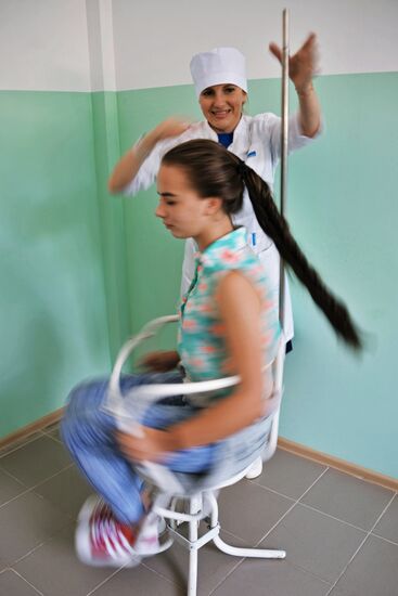 Young women take exams while enrolling at Krasnodar Aviation School