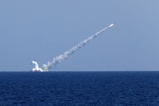Launching Kalibr cruise missiles at terrorist targets in Syria