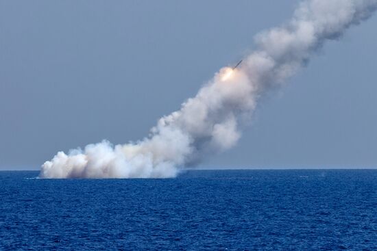 Launching Kalibr cruise missiles at terrorist targets in Syria