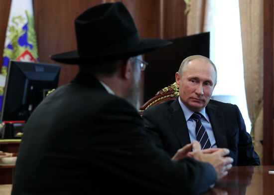 President Vladimir Putin meets with Chief Rabbi of Russia Berl Lazar and Head of Federation of Jewish Communities of Russia Alexander Boroda