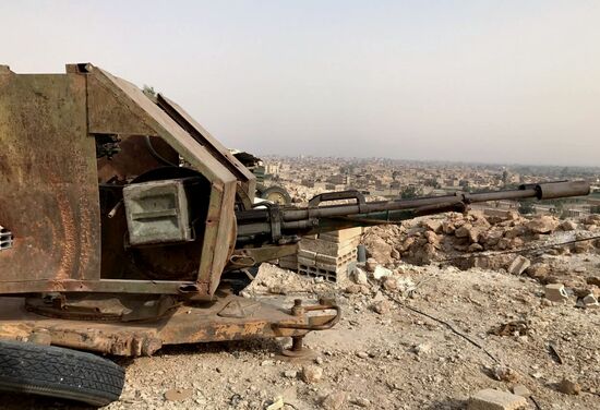 Syrian army and people's militia during offensive operation near al-Jafra in Deir-ez-Zor