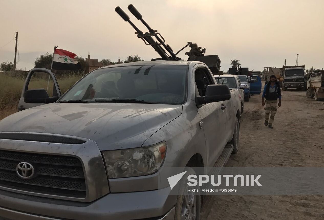 Syrian army and people's militia during offensive operation near al-Jafra in Deir-ez-Zor