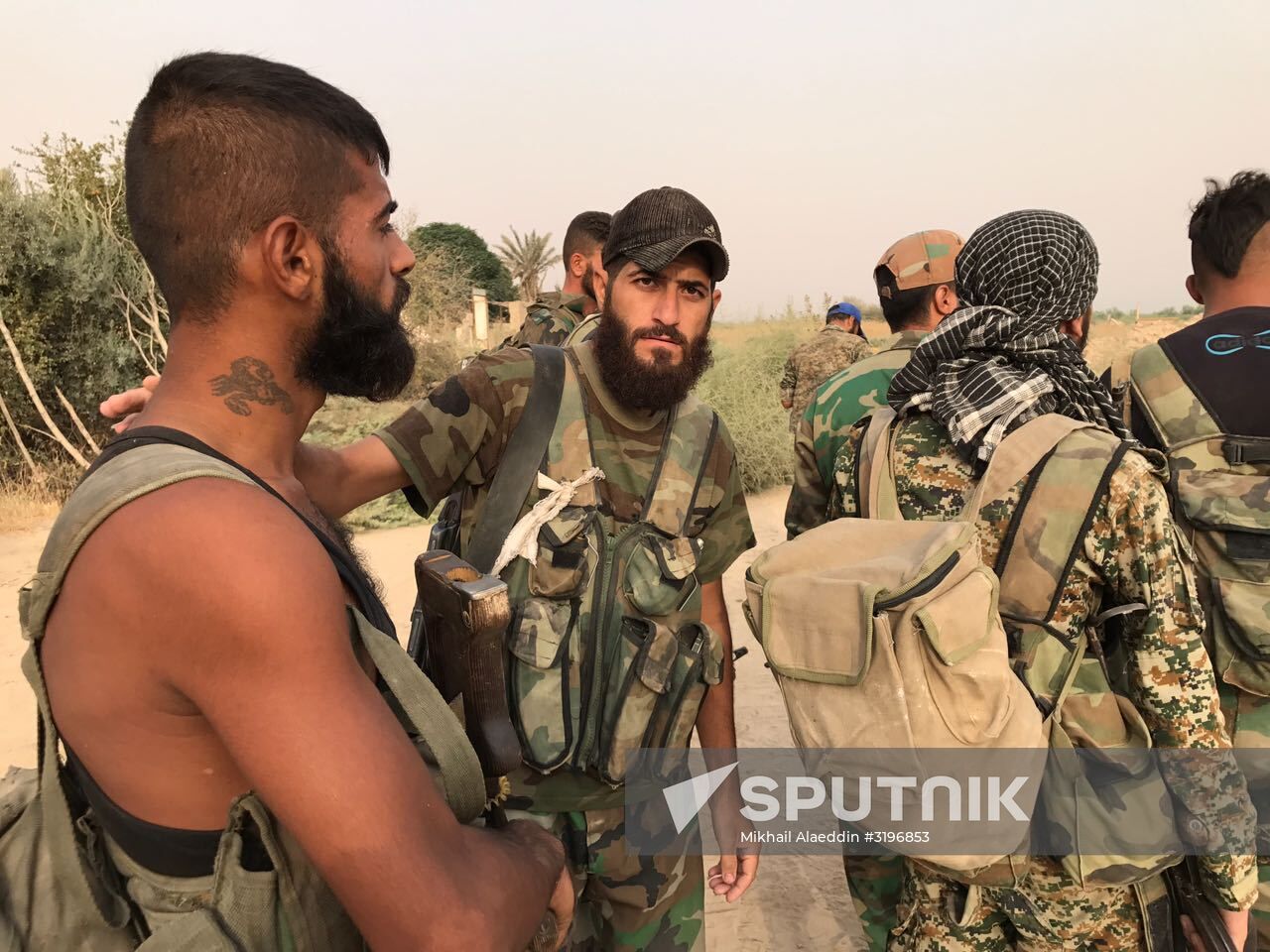 Syrian army and people's militia during offensive operation near al-Jafra in Deir-ez-Zor