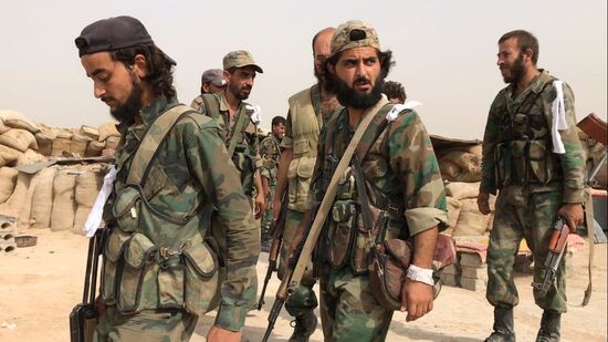 Syrian army and people's militia during offensive operation near al-Jafra in Deir-ez-Zor