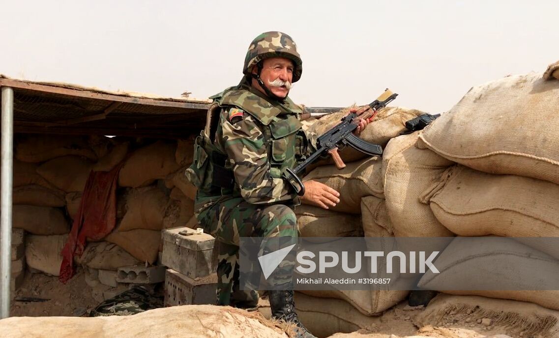 Syrian army and people's militia during offensive operation near al-Jafra in Deir-ez-Zor