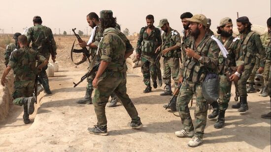 Syrian army and people's militia during offensive operation near al-Jafra in Deir-ez-Zor