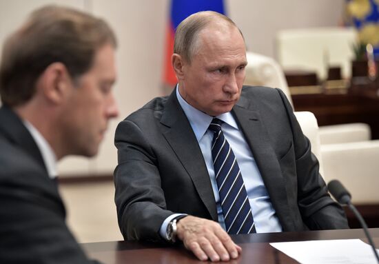 President Putin holds working meeting with Denis Manturov and Maxim Oreshkin