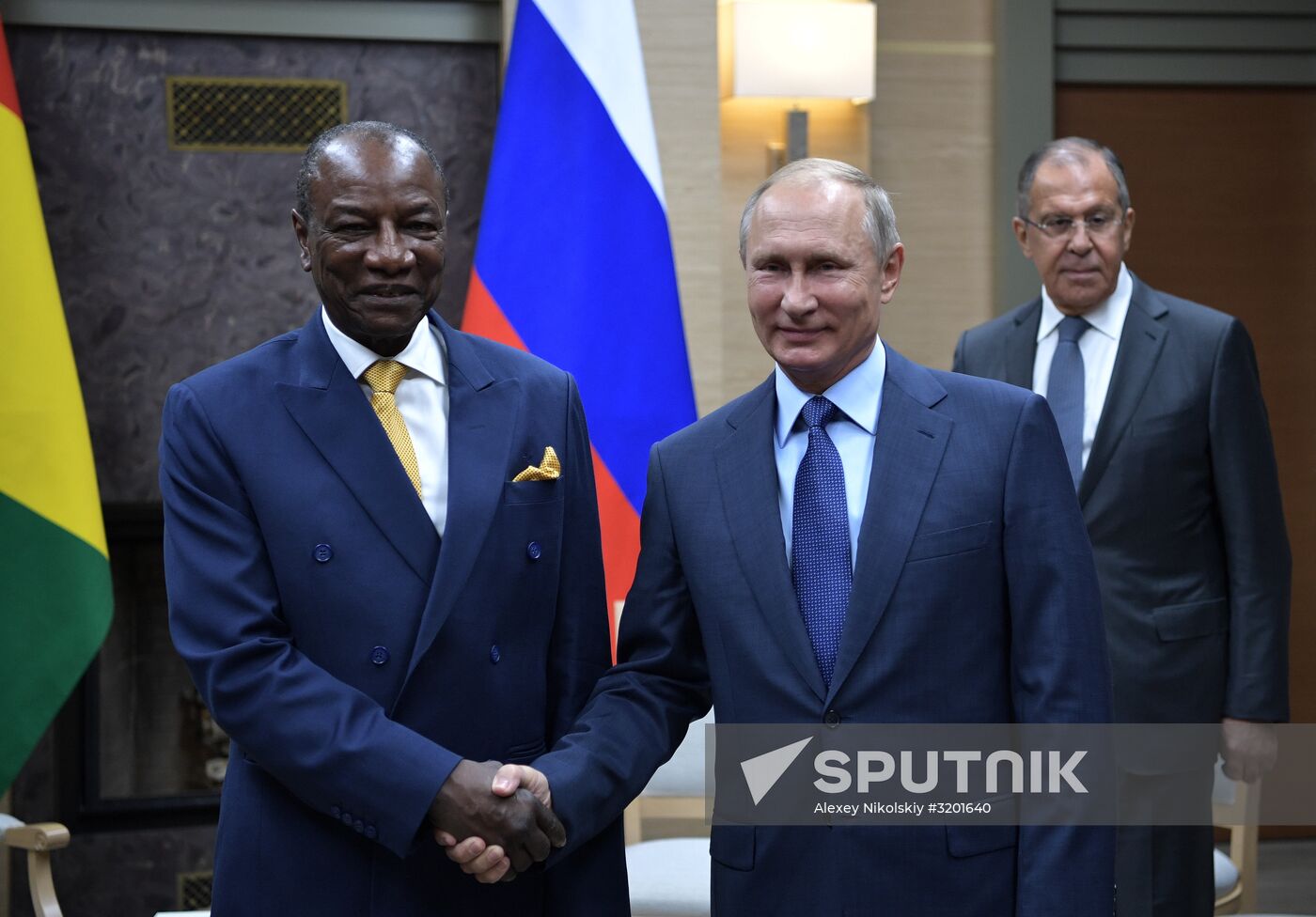 Russian President Vladimir Putin meets with President of Guinea Alpha Conde