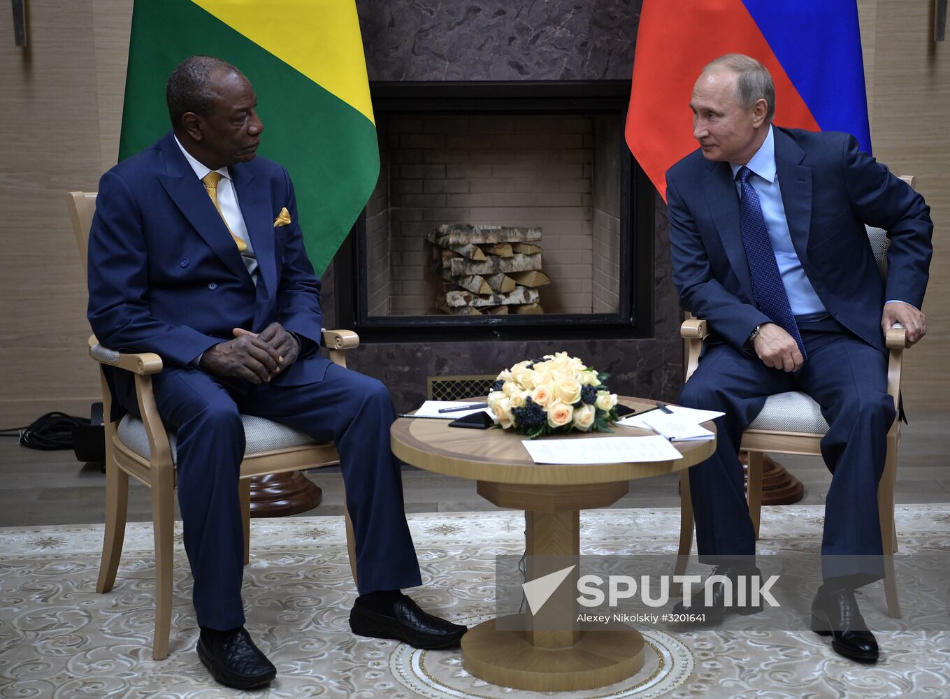 Russian President Vladimir Putin meets with President of Guinea Alpha Conde