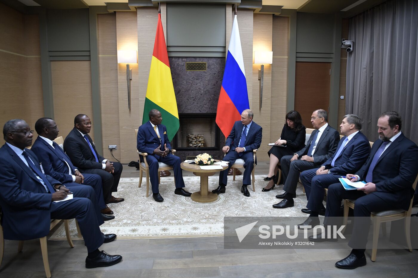 Russian President Vladimir Putin meets with President of Guinea Alpha Conde