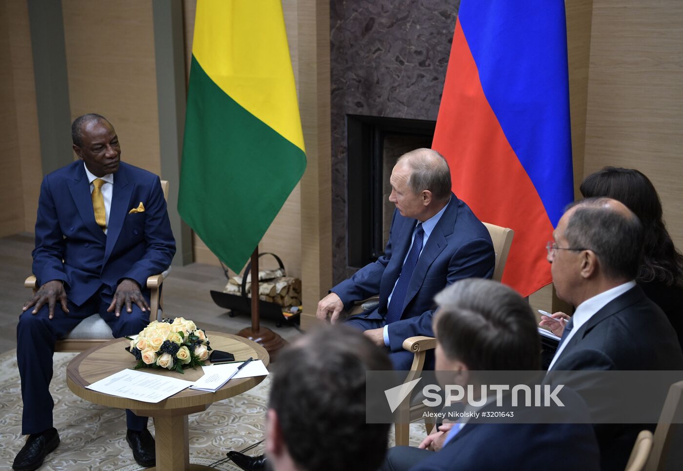 Russian President Vladimir Putin meets with President of Guinea Alpha Conde