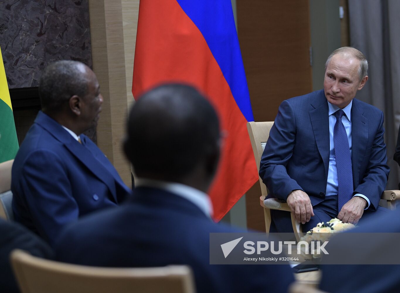 Russian President Vladimir Putin meets with President of Guinea Alpha Conde