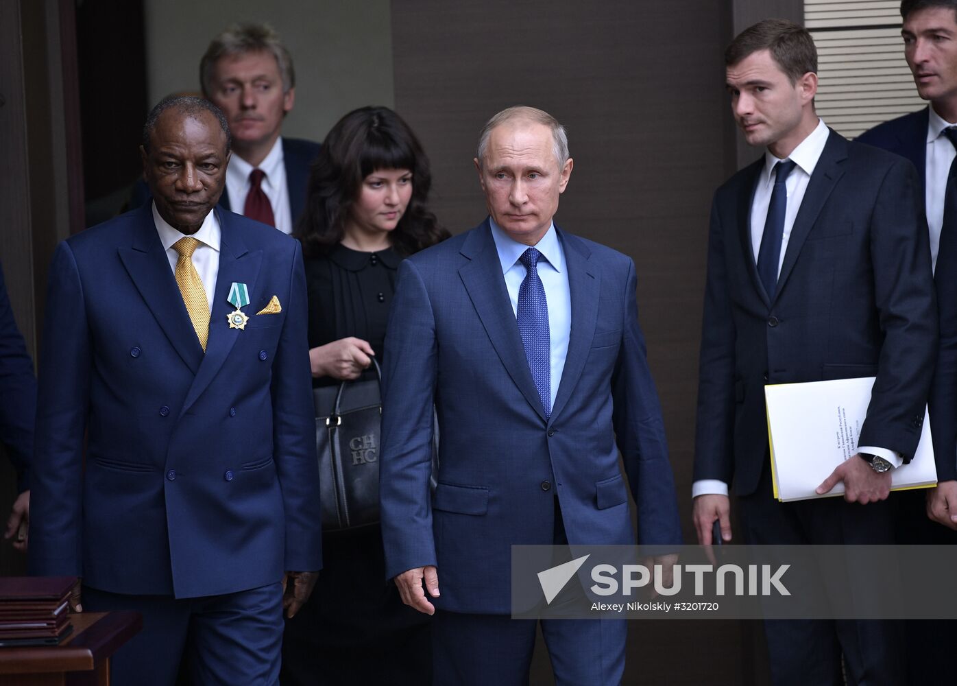 Russian President Vladimir Putin meets with President of Guinea Alpha Conde