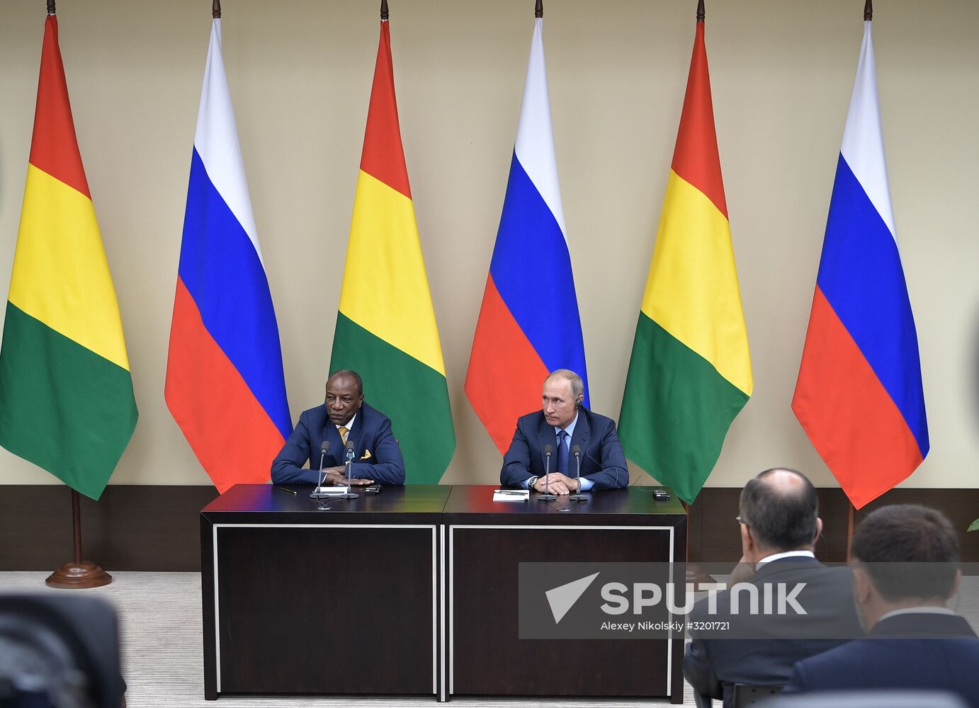 Russian President Vladimir Putin meets with President of Guinea Alpha Conde