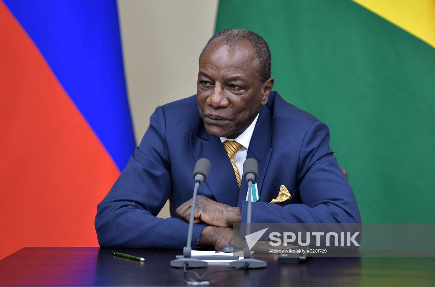 Russian President Vladimir Putin meets with President of Guinea Alpha Conde