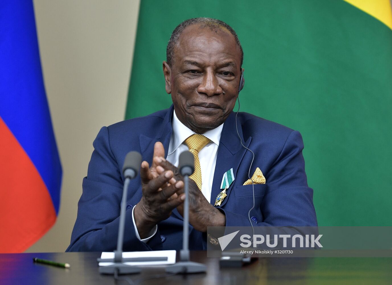 Russian President Vladimir Putin meets with President of Guinea Alpha Conde