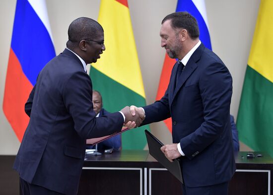 Russian President Vladimir Putin meets with President of Guinea Alpha Conde