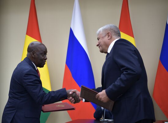 Russian President Vladimir Putin meets with President of Guinea Alpha Conde