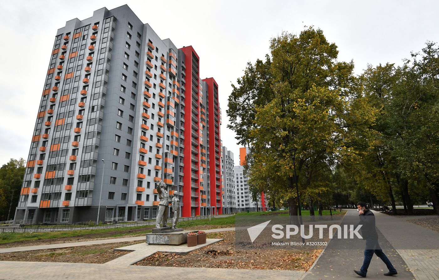 First houses for participants in relocation program