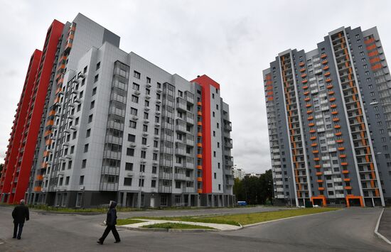 First houses for participants in relocation program