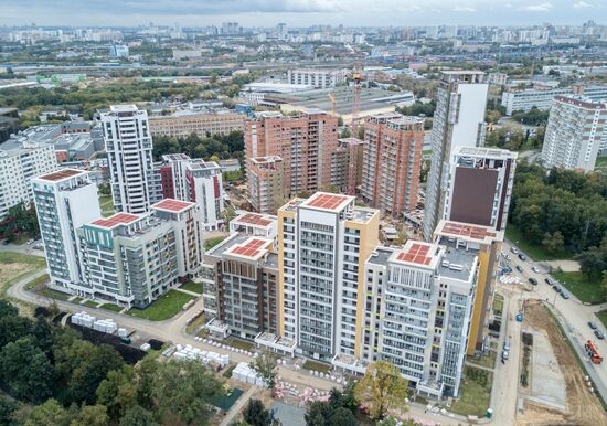 First houses for participants in relocation program