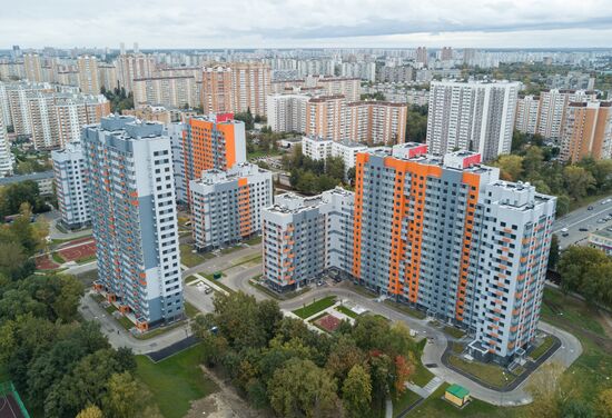 First houses for participants in relocation program
