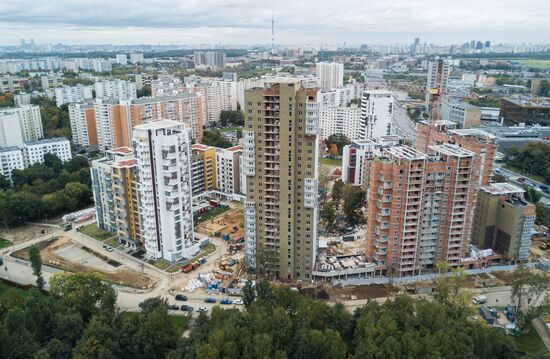 First houses for participants in relocation program