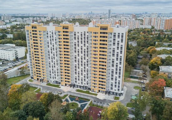 First houses for participants in relocation program